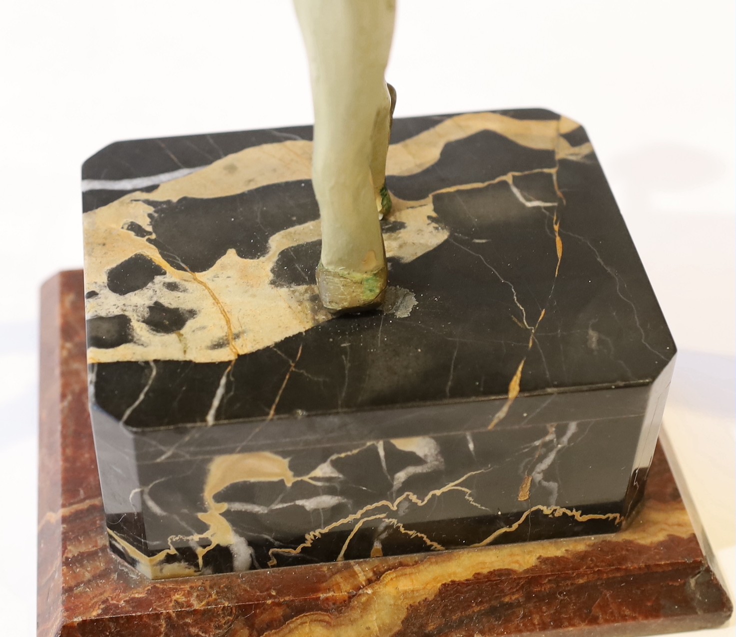 A 1920s French composition and metal butterfly dancer table lamp, on marble plinth, height 42cm